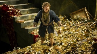 Bilbo ankle deep in gold in the castle chambers